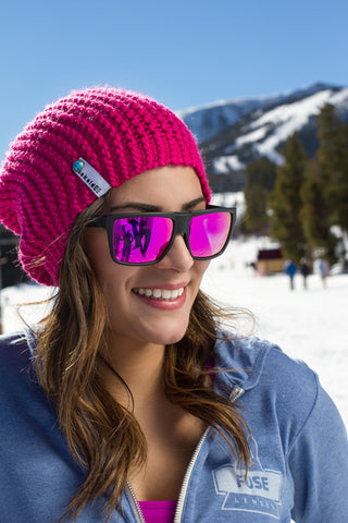 Women skiing in polarized and uv protected sunglasses