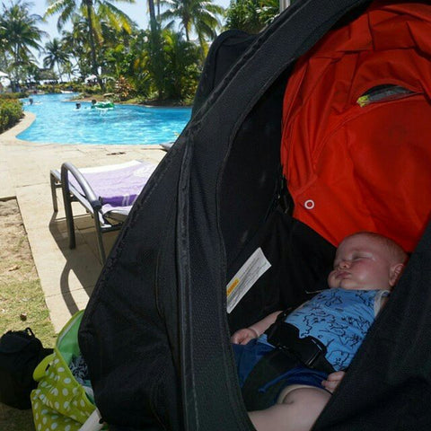 cozigo stroller cover by the pool