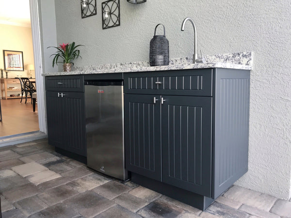 Beautiful gray outdoor kitchen cabinets