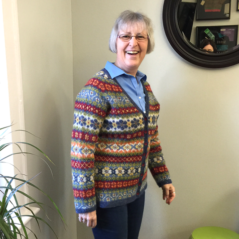 Janet Rice-Bredin wearing her hand knitted Hedgerow sweater 