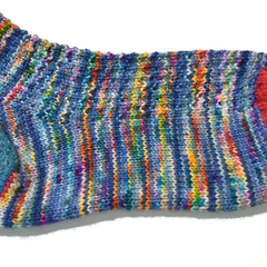 Hand knitted sock using Hedgehog Fibre Sock yarn in the Kimono colourway.