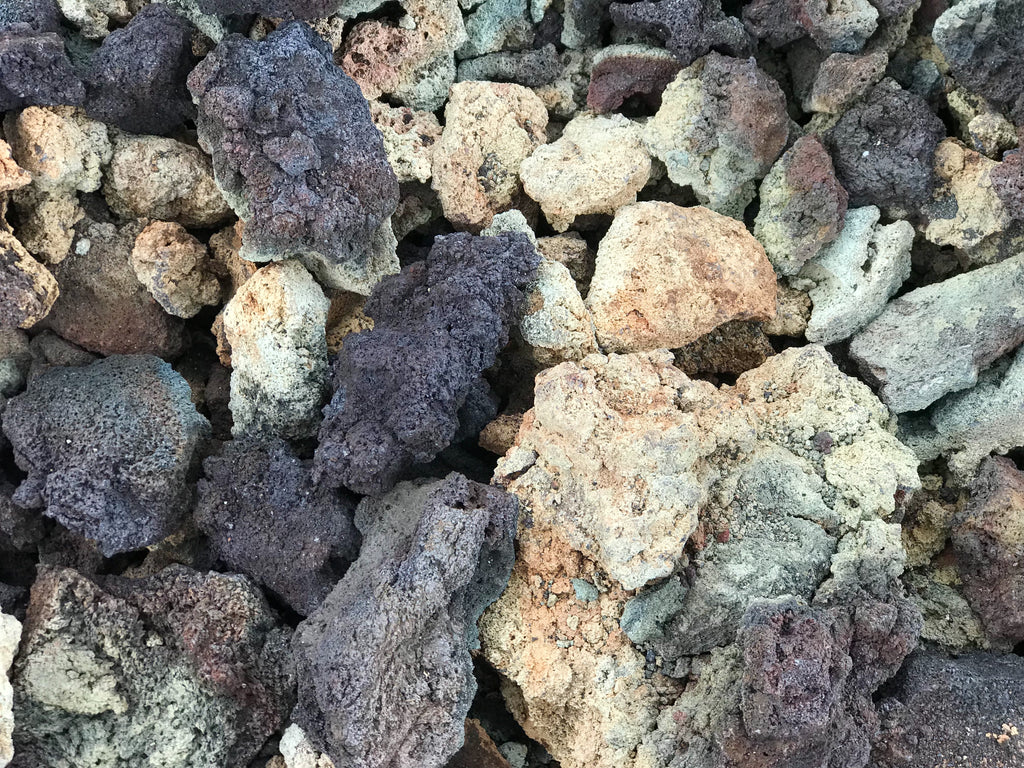 Lava rocks changing color due to sulfur