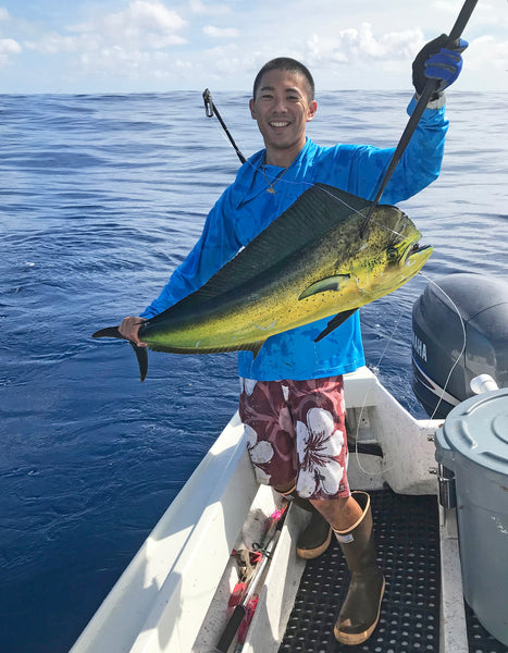 Ryan Kagami with the Mahi-mahi catch Sundot Marine Flags Ohana