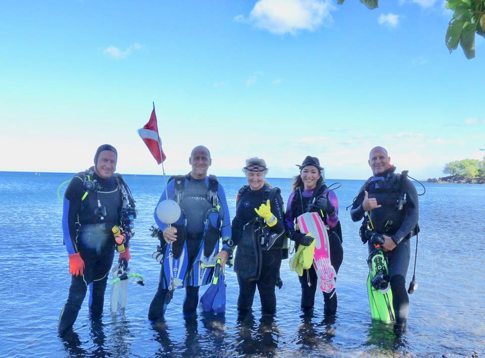 Scuba diving beach cleanup crew