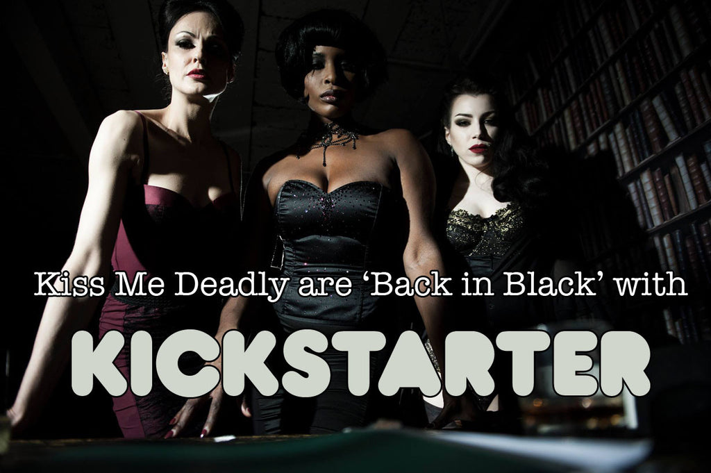 Three models stare you down in film noir lighting, wearing retro, 50's styled lingerie and corsets. A kickstarter logo is underneath.