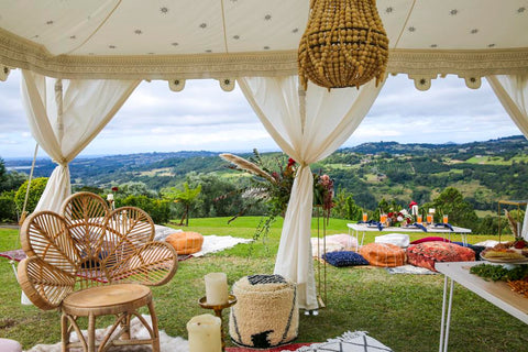 wedding setup at summer grove estate with rugs and cushions and arabian tents by exotic soirees