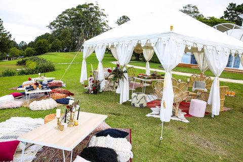 exotic soirees white wedding raj tent and marquee with a bohemian styled setup