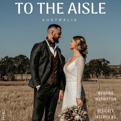 to the aisle front cover article with bride and groom with exotic soirees luxury marquee hire on the gold coast