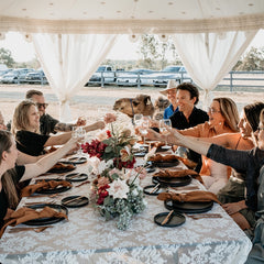wedding guests under a luxury pavilion marquee canopy with a camel