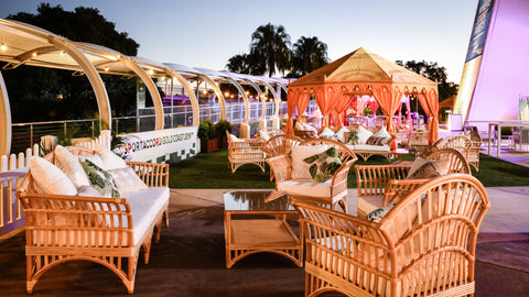 Luxury marquee and cane furniture installation at the gold coast convention and exhibition centre by exotic soirees garden tent hire