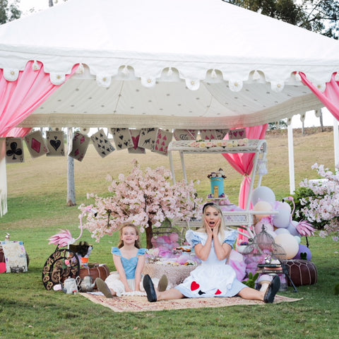 mad hatters tea party with luxury tent for hire from exotic soirees