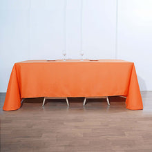 90"x132" Orange Polyester Rectangular Tablecloth