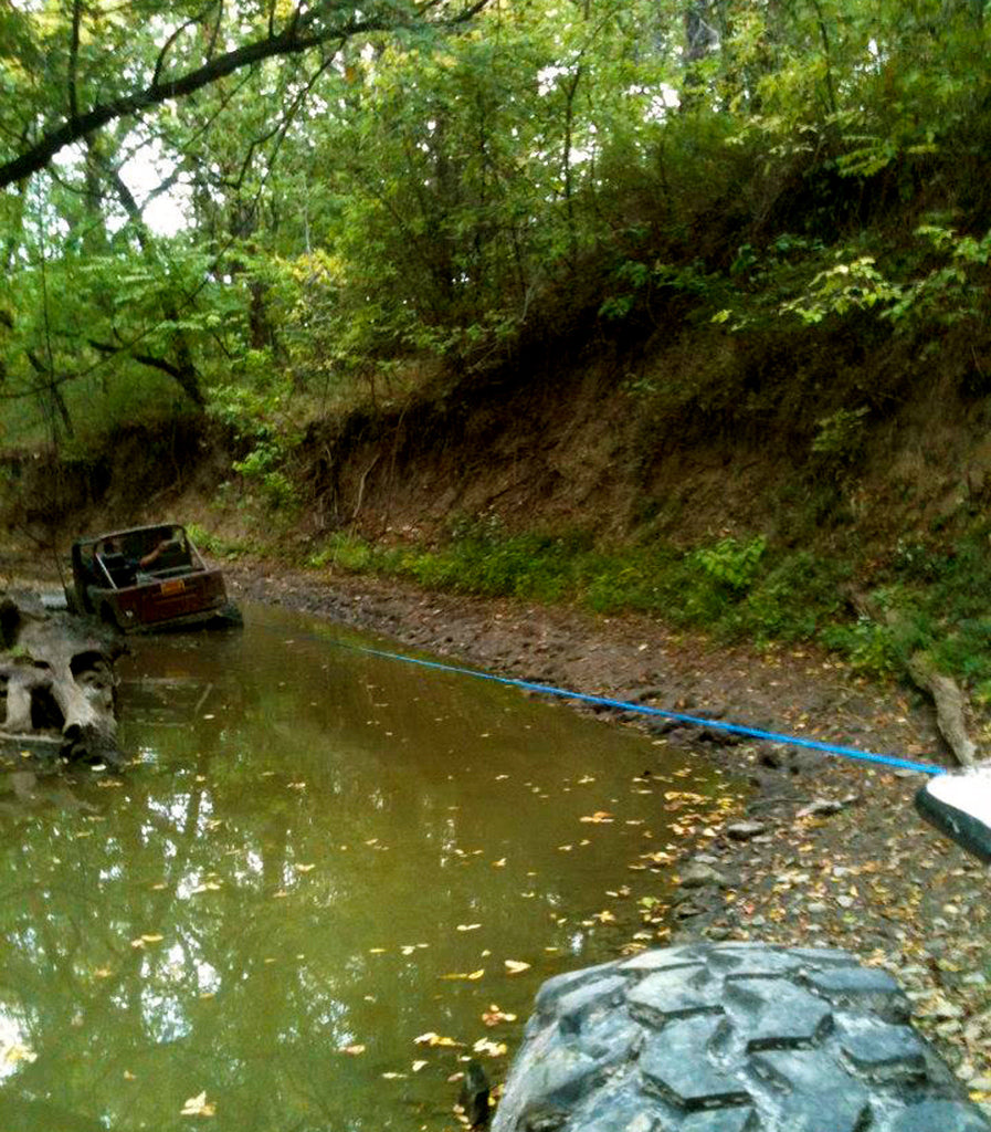 Using Custom Splice Synthetic Winch Rope to recover a jeep stuck in a creek.