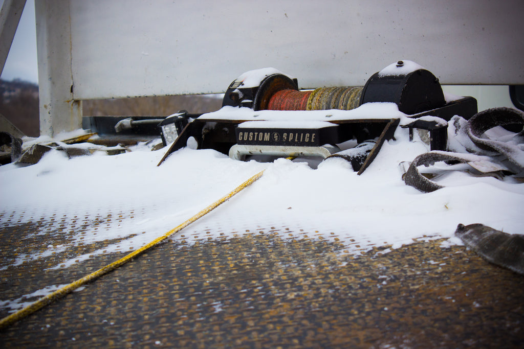 Custom Splice - Miller Industries Rollback Wrecker Fairlead installed and in use on a rollback.