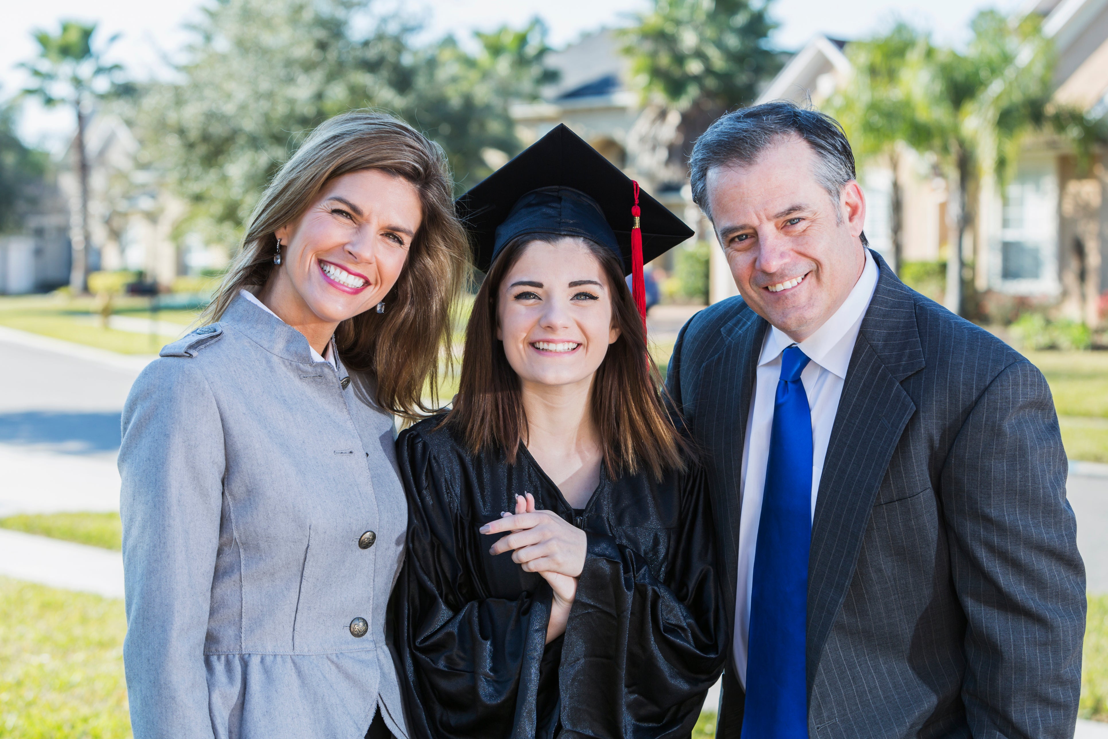 family porch portrait graduation during COVID