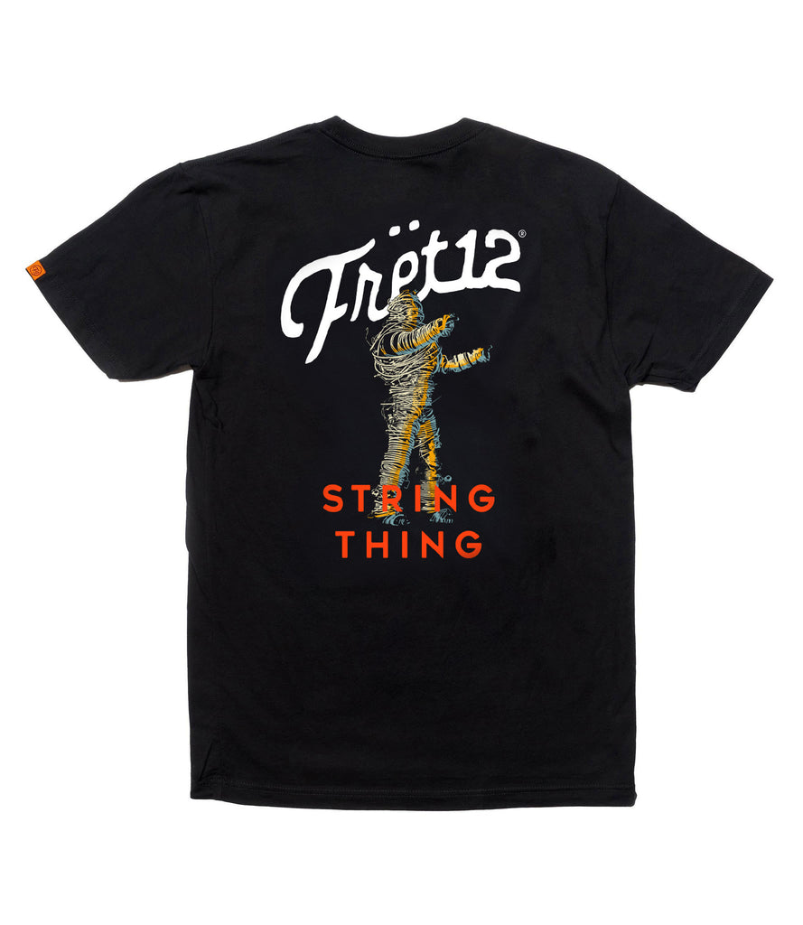 Back of shirt featuring FRET12 logo, String Thing graphic, and STRING THING text in all caps, in orange. 