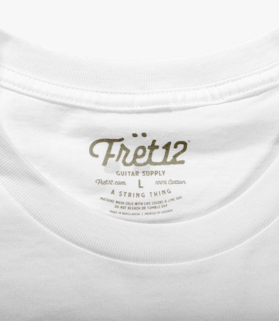 Closeup of printed Fret12 tag on inside of shirt.