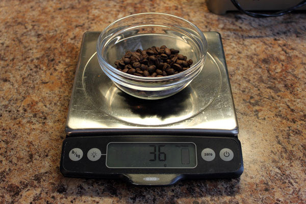 weighing coffee beans