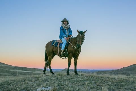 Designer, Madison McKinley Isner on her horse Comanche at the Steerhead Ranch.