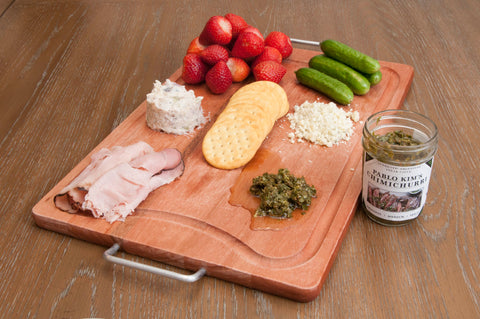 Charcuterie board with Pablo Kim's fresh Chimichurri