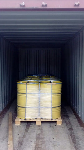 3. Honey purchased in 300kg drums, being loaded here into a 20ft shipping container
