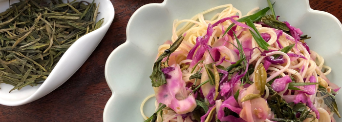 capellini salad with fennel, pickled cabbage, and spring green tea leaves.