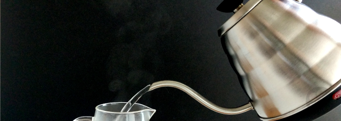 an electric kettle is a convenient modern method to boil water in any location