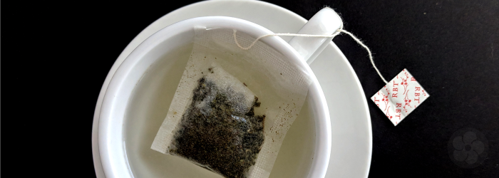 placing a teabag in cold water before microwaving will prevent 'superheating' the water