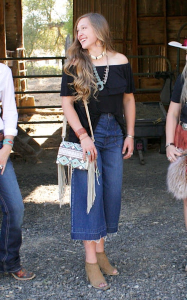 wide leg culotte jean with cowhide bag