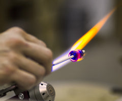 making a glass bead with a torch