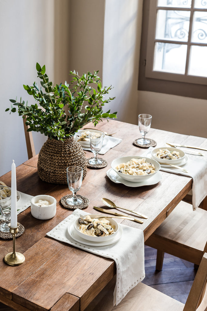 Modern farmhouse table setting with baskets from Artha Collections