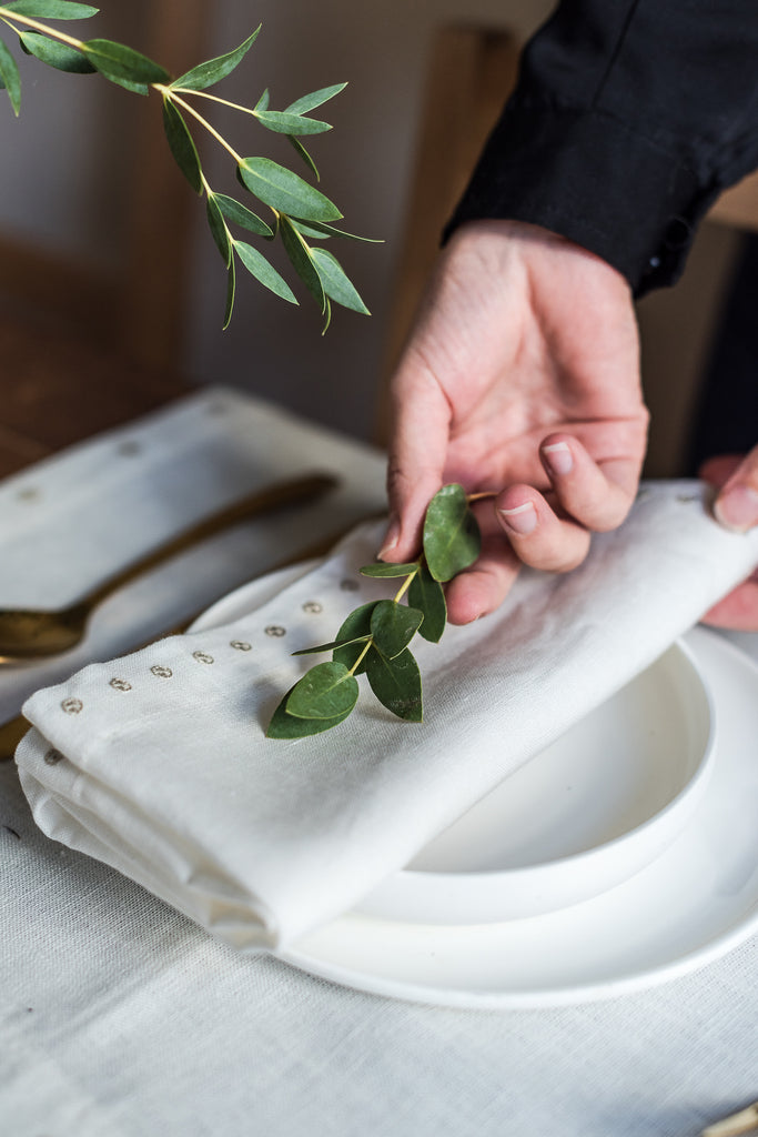 Cream linen napkin with hand embroidery from Artha Collections