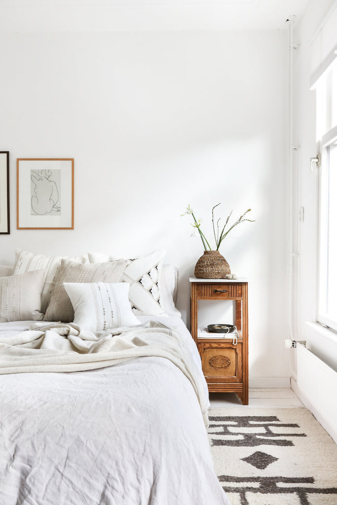 Karakul wool runner rug in bedroom styling by artha collections