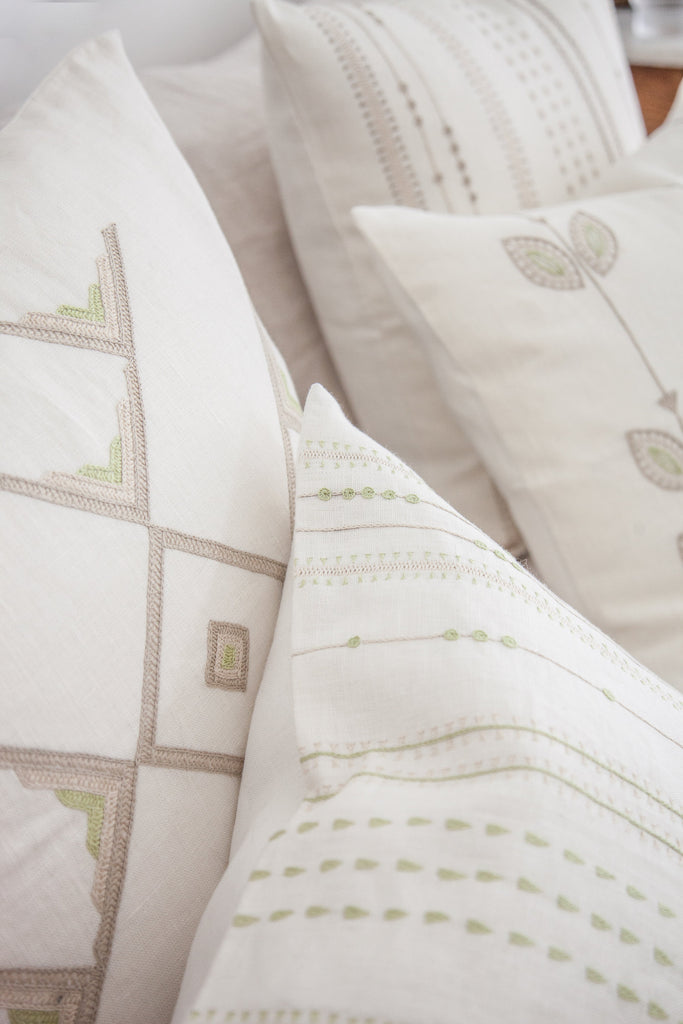 Hand embroidered linen pillows by Artha Collections