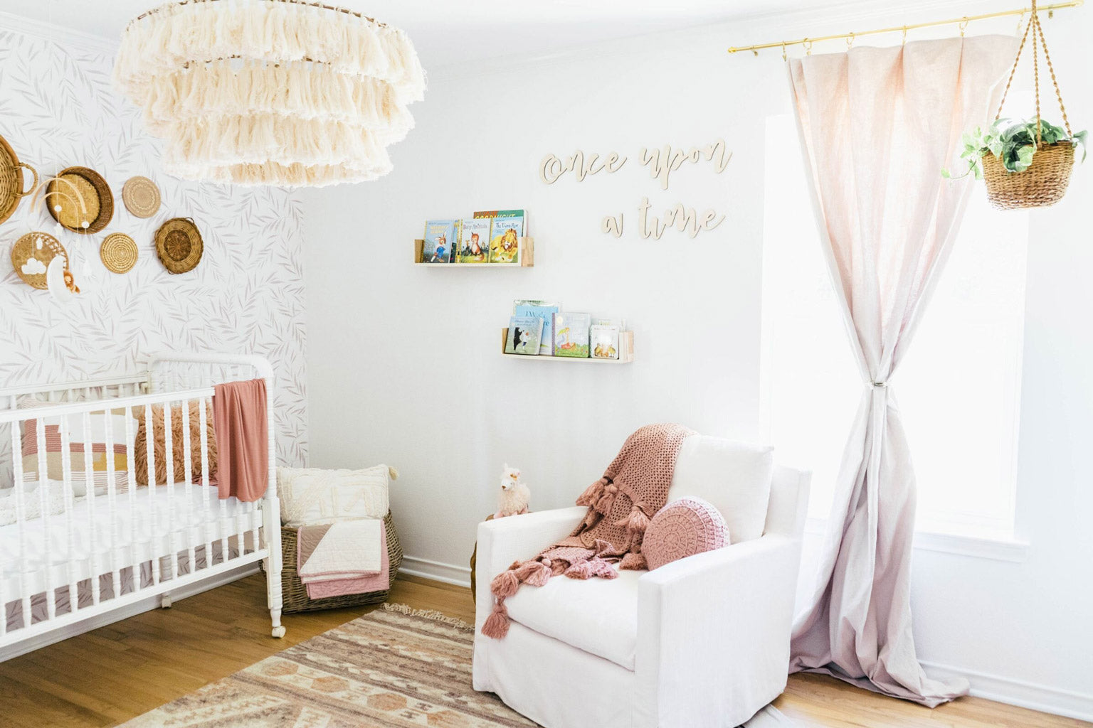 Dreamy baby girl nursery with botanical foliage removable wallpaper
