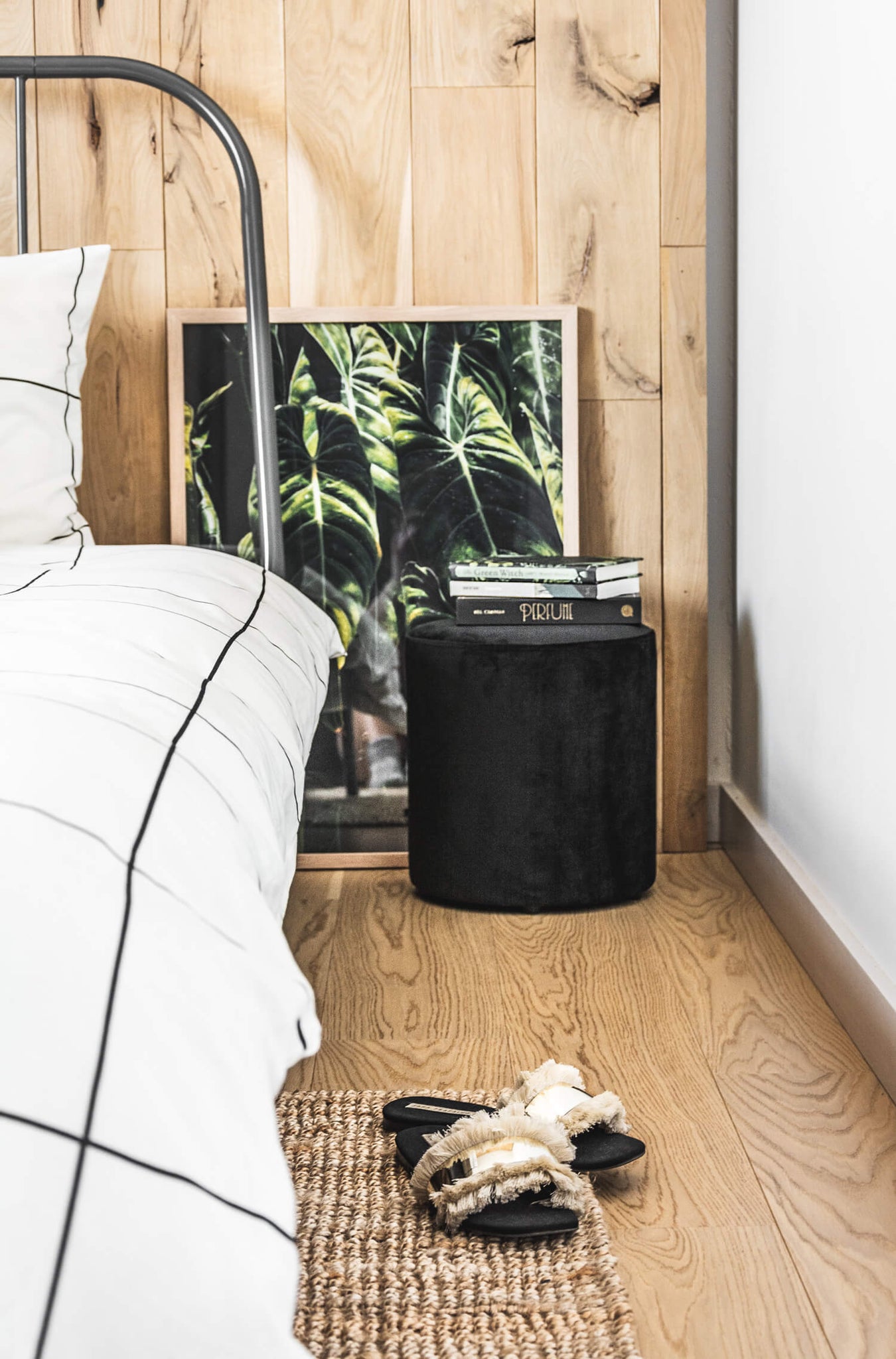 Minimal bohemian bedroom design. Black, white and neutrals color palette bedroom with black nightstand and green decor. One room challenge 2019.
