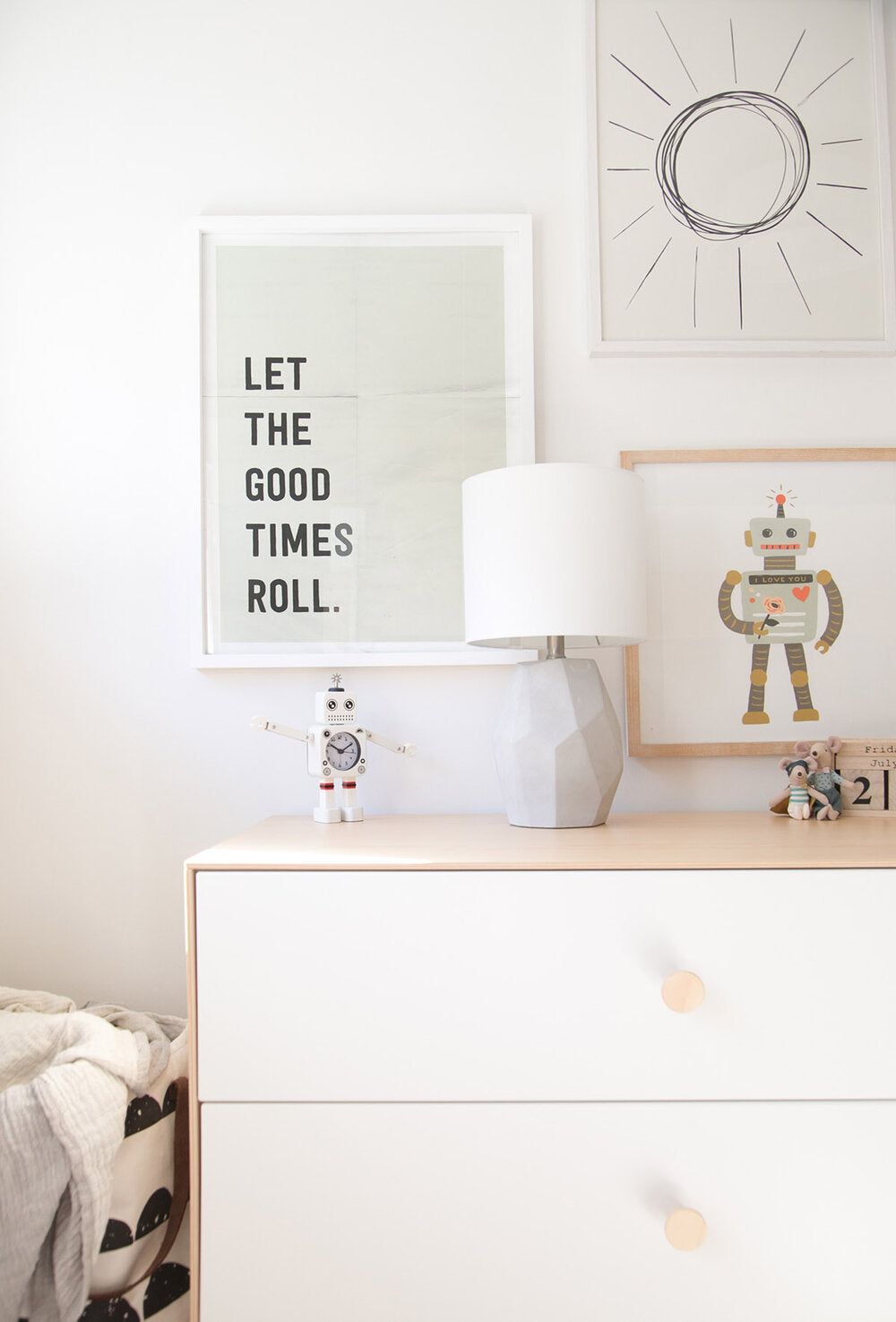 Boys room gallery wall with robots and minimal style art