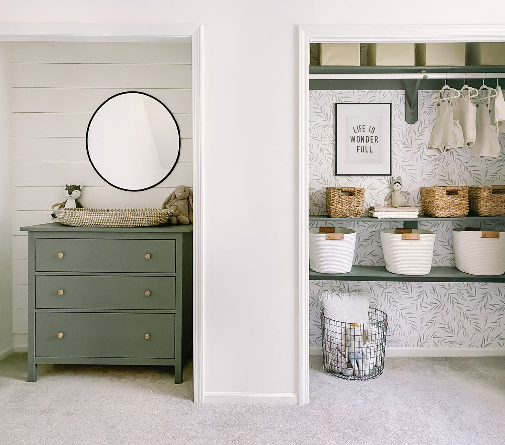 Modern bohemian gender neutral nursery design with olive green accent colour and foliage removable wallpaper