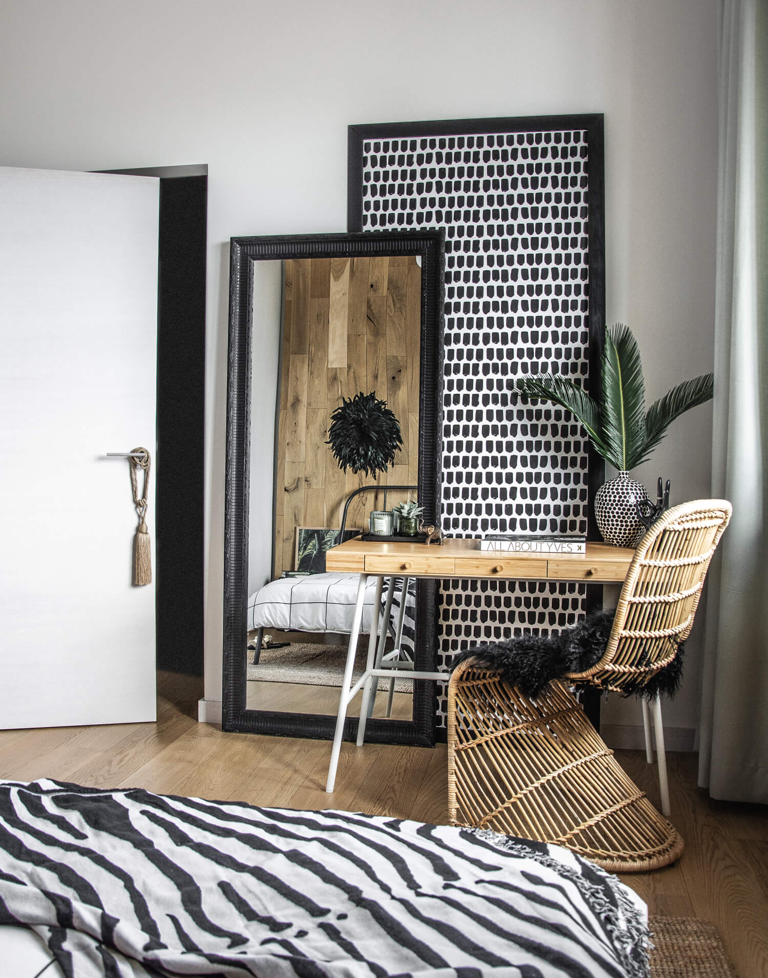 Modern safari inspired bohemian bedroom interior. Pattern mixing and large scale art in bedroom interior. One Room Challenge 2019.