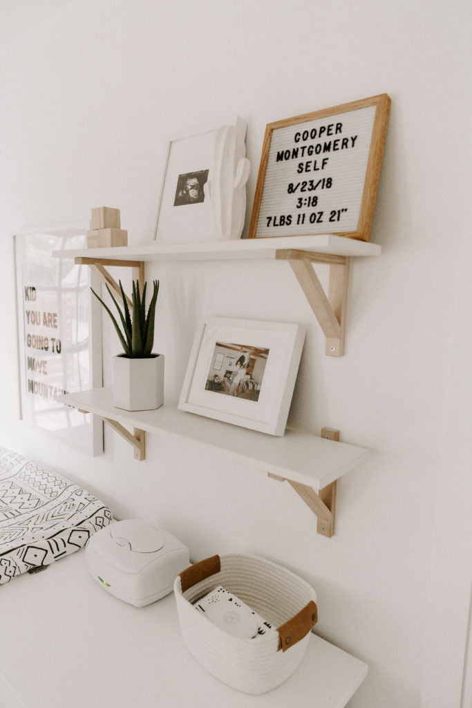 Modern design boho nursery changing table in white interior