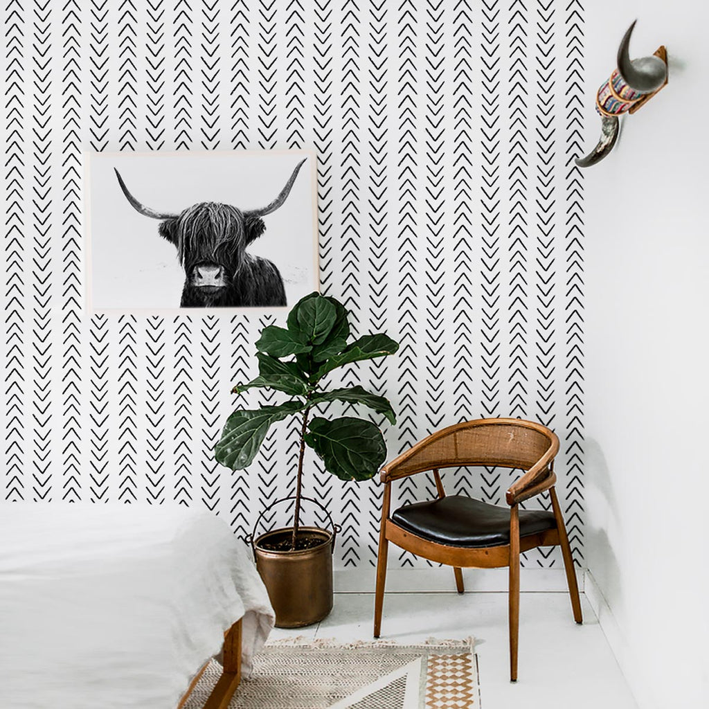 Scandi boho interior with black and white removable wallpaper