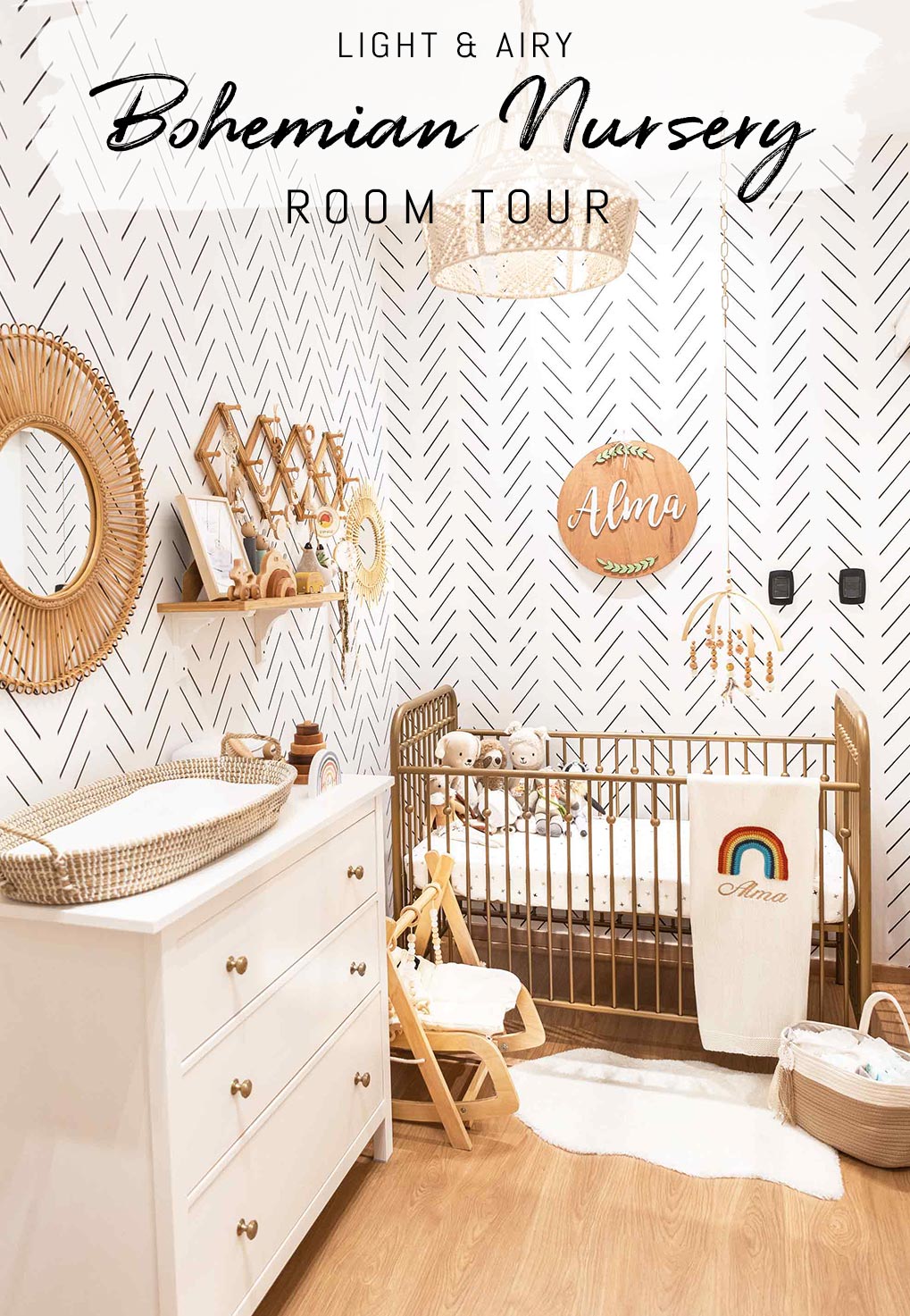 White and wood tone baby nursery interior with herringbone livettes wallpaper