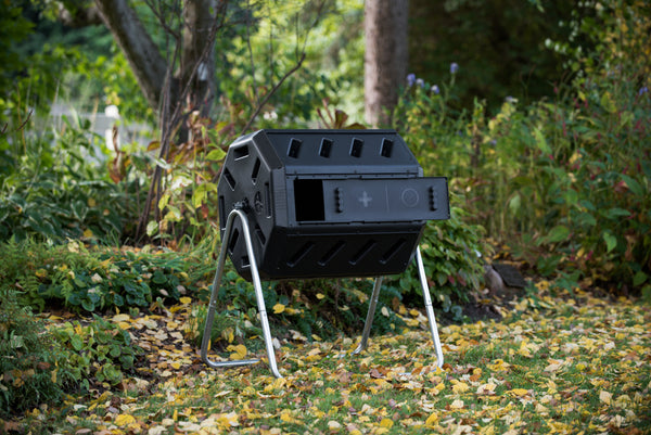 YIMBY Dual Chamber Tumbling Composter in backyard