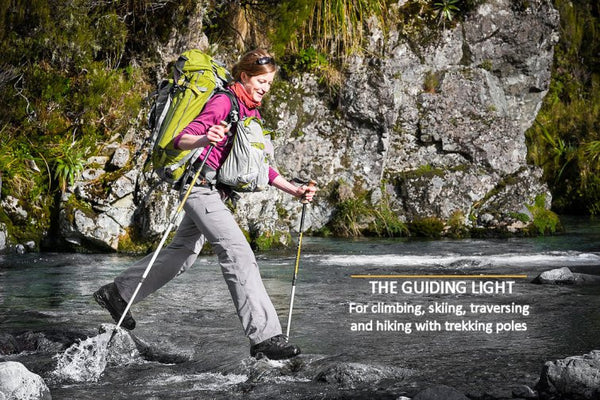 Woman hiking wearing a 57 liter Aarn Guiding Light Balance backpack