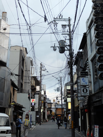 Electricity wires in a street in Kyoto. Photo by Niki Fulton