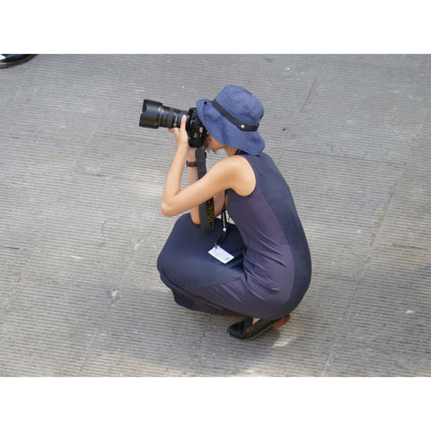 Photographer at Pitti Immagine Uomo. Photo by Niki Fulton