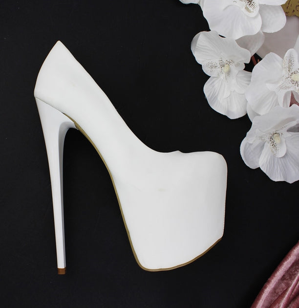 platform white pumps