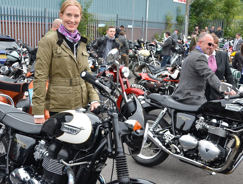 stylish lady with triumph dressed in tweed