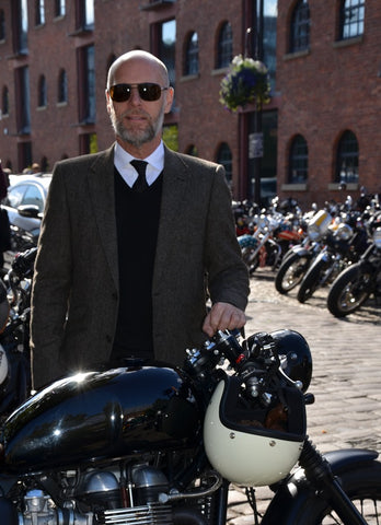gentlemans ride manchester chap in tweed and sunglasses