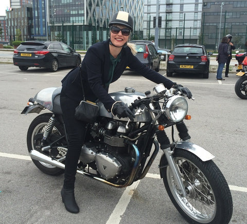 very stylish lady aboard triumph cafe racer Manchester gentlemans ride